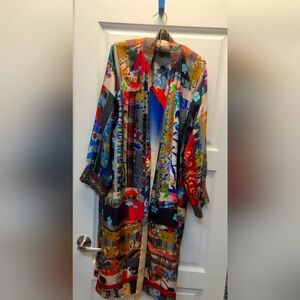 Striking Red and Blue Artistic Cape with Flowing Design